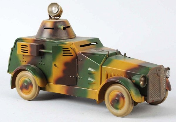 Lineol Armored Car with Cannon Searchlight.: With operating cannon and detached grille. Headlights and clockwork mechanism have not been tested. Condition (Very Good - Excellent).