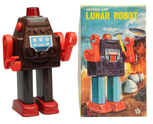 Tin Litho Painted & Plastic Wind-Up Lunar Robot.: Japanese, Yonezawa. Working. Includes box with inserts. Condition Toy (Near Mint) Box (Excellent). Size 7 - 1/2" T.