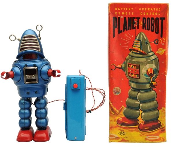 Painted Tin Battery-Operated Planet Robot.: Japanese, Yoshiya. Working. Thin paint on one side of torso and some minor oxidation to chrome. Also, one foot has a spot of heavy oxidation and the remote has some crazing throughout. Includes origin