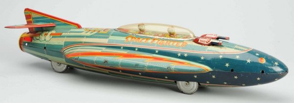 Tin Litho Friction Space Fighter.: Japanese, Okada. Working. Two the two gun turrets on top are professional replacements. Some scratching throughout, mostly notably on the tip of the rocket and on the bottom. Also, one very small stre