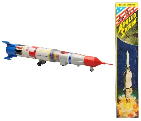 Tin & Plastic 2 Stage Moon Rocket Apollo Saturn.: Japanese, Nomura. Working. Includes original box. Condition (Near Mint). Size 21 - 1/4" L.