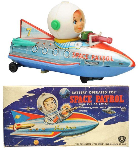 Tin Litho & Plastic Battery-Op Space Patrol.: Japanese, Masudaya, Modern Toys. Working. Plastic head and gun with tin litho body and plastic under carriage. When batteries are put in, toy has bump-and-go action, gun flashes, and emits a shooting 