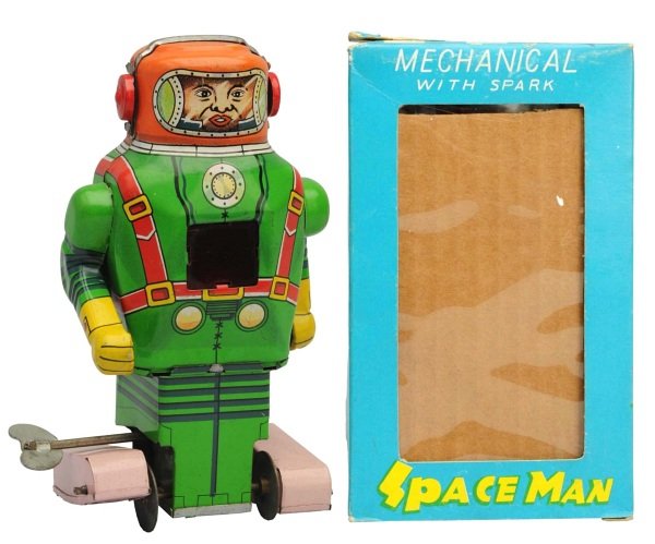 Tin Litho Wind-Up Space Man Robot.: Japanese, Noguchi. Working. Original box included with two tears to end flap. Condition Toy (Near Mint) Box (Excellent). Size 5 - 1/2" T.