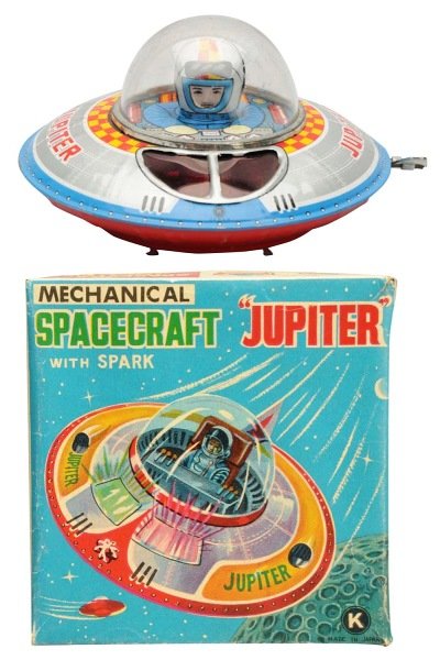 Tin Litho Wind-Up Spacecraft Jupiter.: Japanese, Ohta. Working. Toy has some scratching to the left side of the dome and very light scratching in the dome. Includes original box and insert with one corner tear repair to the box. Toy (Excel