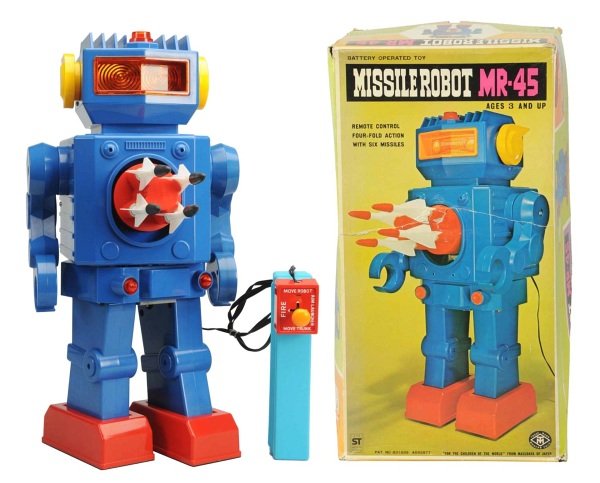Plastic & Tin Missile Robot MR-45.: Japanese, Masudaya. Battery-Operated. Walks sporadically. Original box included with inserts and one repaired tear across face. Condition Toy (Near Mint) Box (Very Good). Size 17 - 1/2" T.
