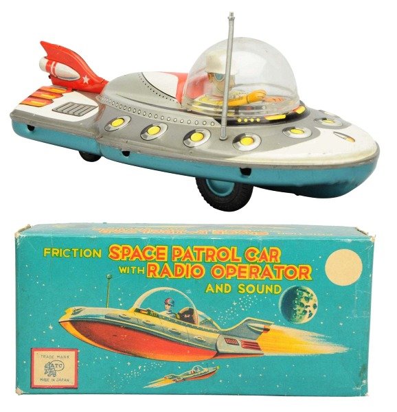 Tin Litho Space Patrol with Radio Operator.: Japanese, Asahi. Friction, working. Includes original box. Toy (Near Mint) Box (Excellent - Near Mint). Size 8 - 1/2" L.
