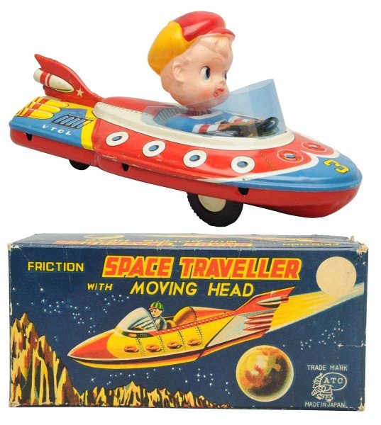 Tin Litho Friction Space Traveler.: Japanese, Asahi. Working. Includes original box with one corner repair. Toy (Near Mint) Box (Excellent - Near Mint). Size 8 - 1/2" L.