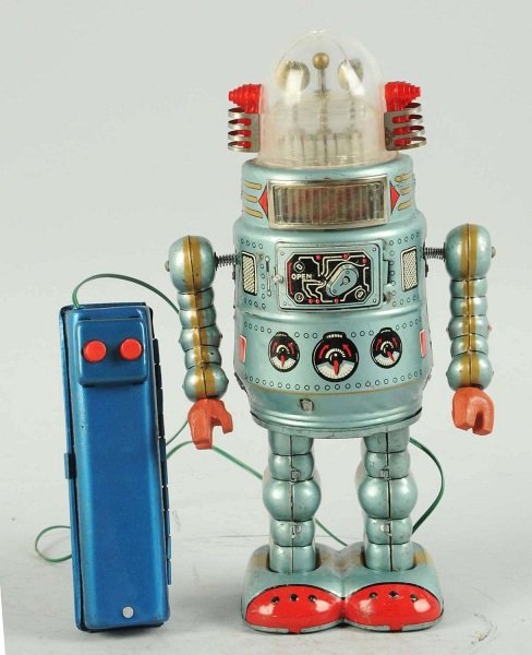 Tin Litho Battery-Operated Door Robot.: Japanese, ALPS. Working. Several areas with scratches and discoloration. Also, the plastic dome is foggy and has some glue marks. The battery remote and wire are both replacements. Condition (Good). S