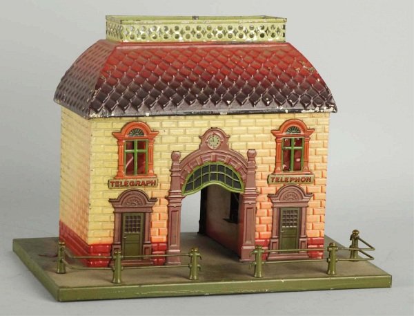 Tin Litho Bing Train Station.: German. Pre-war. Medium-sized telegraph station. Station has been electrified. Minor paint loss and wear to roof and missing top ventilators. Condition (Very Good - Excellent). Size 10" L.