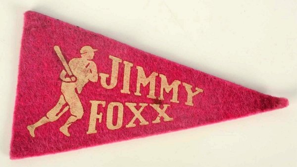 Vintage Felt Jimmy Foxx Mini Pennant.: 1936 to 1938. Type 1. Player name and design to left. One small stain spot in middle of pennant and on tip. Condition (Very Good). Size 4 - 1/4" L.
