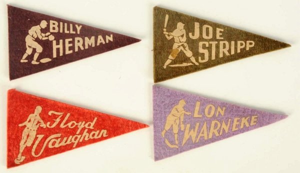 Lot of 4: Vintage Felt Type 1 Mini Pennants.: 1936 to 1938. Includes Lon Warneke, Joe Stripp, Floyd Vaughan, and Billy Herman. The Stripp pennant has some damage. Condition (Very Good - Excellent). Size Each: 4 - 1/4" L.