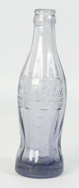 Light Amethyst 1915 Macon, GA Coca-Cola Bottle.: Tiny nicks and light wear. Condition (Excellent). Size 8" T.
