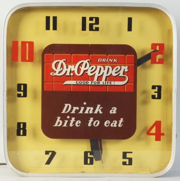 1940s Dr. Pepper Light-Up Clock.: Nice Lackner clock with small marks and light to medium soiling. Condition (Very Good - Excellent). Size 15 - 1/2" T.