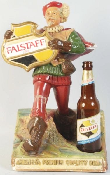 Falstaff Beer Minstrel Advertising Figure.: 1950s. With bottle. Base front has relief text "America’s Premium Quality Beer". Paint chips and overall wear. Condition (Very Good). Size 16 - 1/2" T.