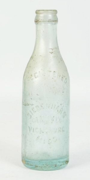 Biedenharn Candy Company Bottle.: Clouded with lip chip, small nicks, and light wear. Condition (Very Good). Size 7 - 1/2" T.