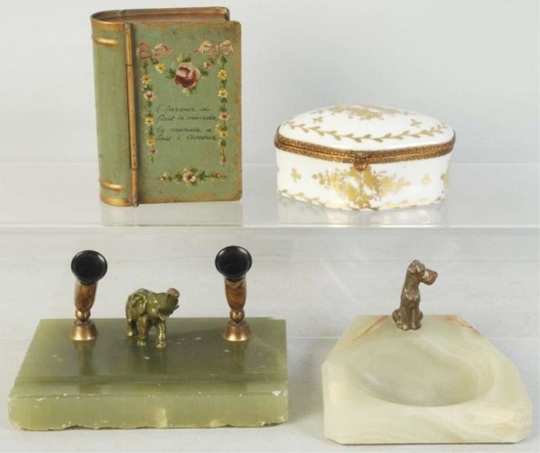 Lot of 4: Art Deco Pieces.: Includes one pen holder with elephant, one Tin Tole box in the form of a book, one French lidded porcelain box, and one marble ashtray with dog. Condition (Excellent). Size Largest: 6" L.