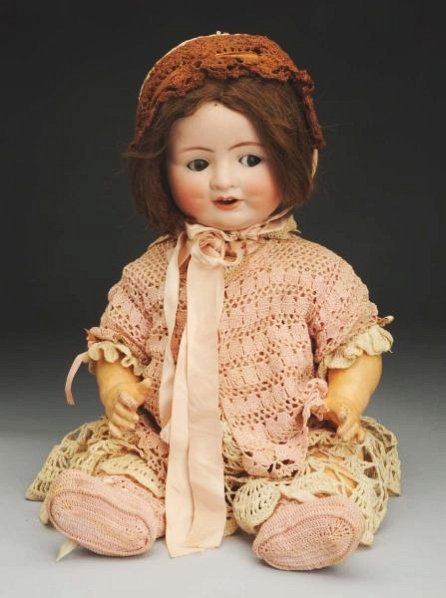 Flirty ABG 1322 Character Baby.: German bisque socket head fully incised made by Alt, Beck & Gottschalck (wig pulls, a few black specks), multi-stroked eyebrow, side-glancing flirty eyes with tin eyelids, open mouth with upper teeth,