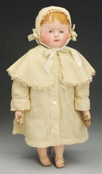 Martha Chase Stockinet Doll.: All cloth with oil painted face and lower limbs, painted thick blonde hair (a little chipping), painted blue eyes (some wear on eyes, crazing on face, cheeks touched up), sateen body (some discolorati