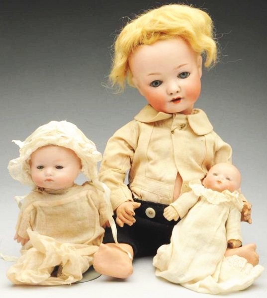 Lot of 3: Baby Dolls.: All with German bisque heads. Ernst Heubach 320 character boy with sleeping eyes, pierced nose, open mouth with teeth, blonde mohair wig, original composition baby body with original finish (needs cle