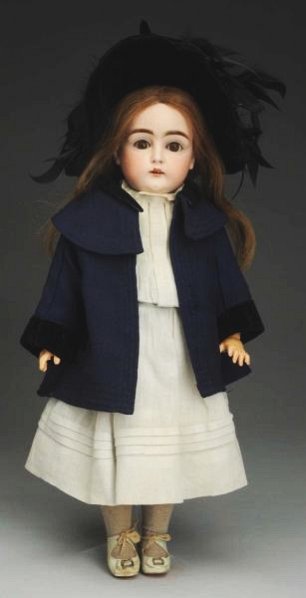 Lovely Kestner Child Doll.: German bisque socket head incised “G made in Germany 11 129” with dark multi-stroked eyebrows, sleeping eyes, painted upper and lower eyelashes, open mouth with teeth, plaster pate, replaced human