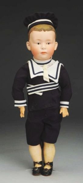 Pouty Gebr. Heubach Character Doll.: German bisque socket head incised 7602 with Heubach sunburst mark (overall speckling), lovely flocked hair, shaded eyebrows, dark intaglio eyes with molded sockets, white dot highlight, closed mouth w