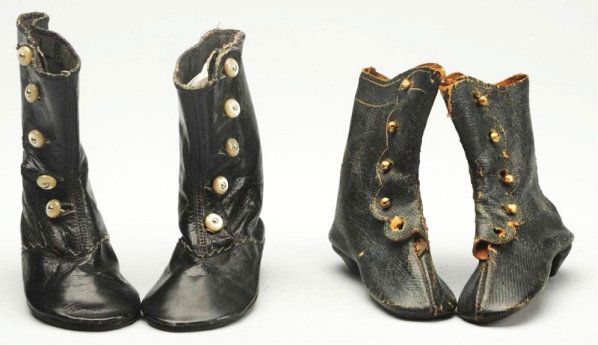 Lot of 2: Pairs of Antique Doll Shoes.: Black leather boots with heels and pearl buttons, another pair with gold buttons. Some wear. Hard to find in this large size! Condition (Very Good). Size Largest: 3 - 3/4" L.