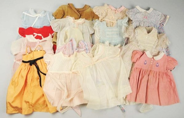 Lot of Vintage & Antique Dresses.: About 25 dresses, mostly for children, mostly cotton and organdy but a few nylon, for large dolls or fabric can be used to make smaller dresses. Condition (Excellent).