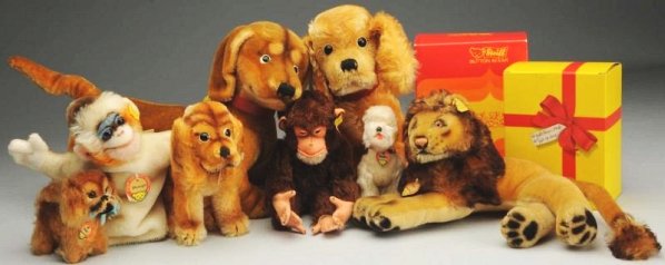 Lot of 8: Steiff Animals.: All are mohair. Large Hexie with movable head and tags; large Susi, no tag but FAOSchwarz label; small Susie with label; Leo lion with label; Jocko with joints and label; Mungo hand puppet with label;