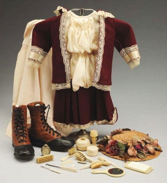 Lot of Doll Clothing & Accessories.: Newly made maroon wool and cream silk dress from antique fabrics, silk child’s coat on a metal display rack; child’s two-tone leather high top shoes; straw hat with flowers; antique celluloid acce