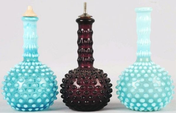 Lot of 3: Hobnail Barber Bottles.: Includes two aqua and white opalescent and one amethyst. The two aqua have minor loss of hobs and a few expected rough spots. Condition (Very Good - Excellent). Size Largest: 8 - 1/4" T.