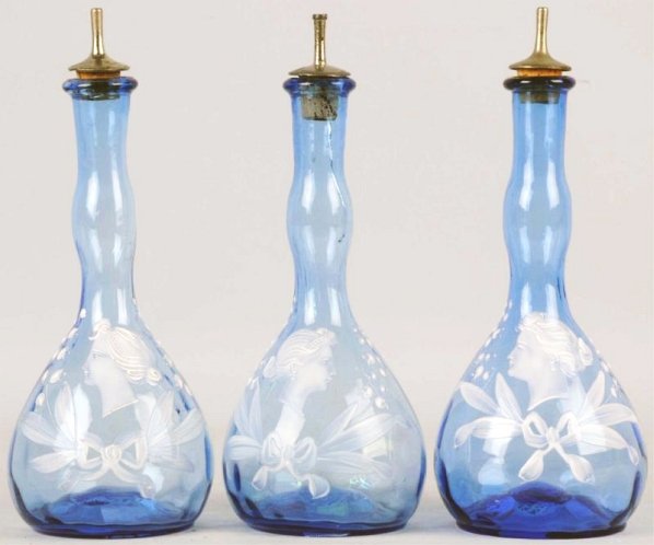 Lot of 3: Light Blue Cameo Head Barber Bottles.: Two of the cameo heads face left and one faces right. No cracks, chips or repairs. All have scarred pontils on the bottom. Condition (Very Good - Excellent). Size Each: 9 - 3/4" T.