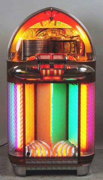 Wurlitzer Model 1100 Jukebox.: Good original restored condition. Functions and plays on 78s. Circa 1948. Condition (Restored). Size 58" T.