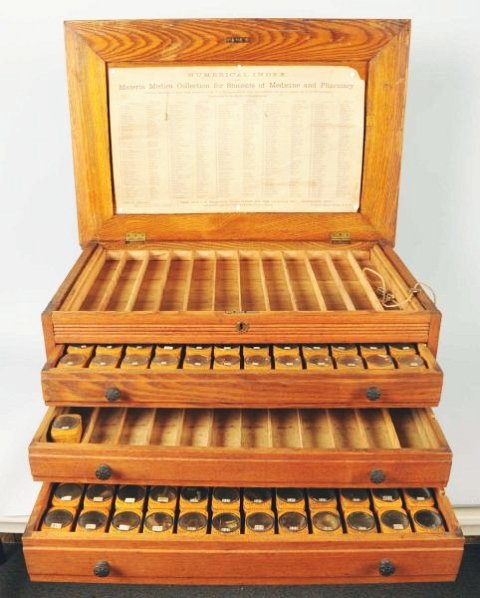 Parke, Davis & Co. Apothecary Pharmacy Cabinet.: Rare. With 145 Park Davis tins and glass windows to display the medicine. Top lifts and has lock. Includes three drawers and a cardboard numerical index. The tins alone are worth five to ten dollars e