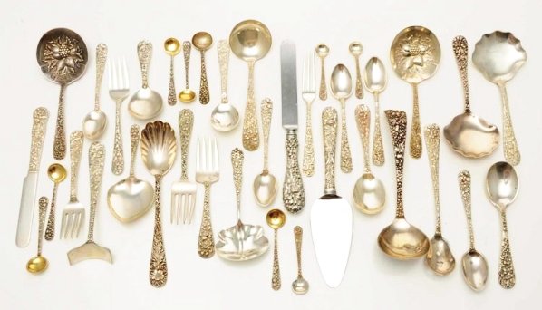 A Group of American Silver Repoussé Flatware.: Mostly Kirk, Stieff, and other makers of similar floral patterns, including 2 gravy ladles; a pair of nut scoops; several small forks; a numerous salt spoons; various tea and coffee spoons; and others