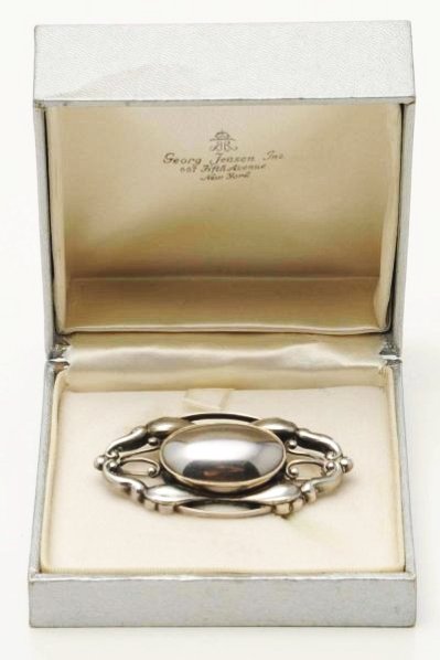 Large Silver George Jensen Pin.: Singed. With original box. Condition (Excellent). Size 2 - 1/4" L.2 - 1/4" L.(Excellent).