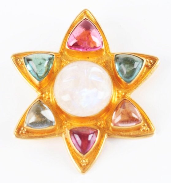 Handmade 22K Gold Carolyn Thayer Pendant.: A very fine handmade 22K Gold Pendant made by Carolyn Thayer. Marked 22K, set with a carved moonstone face and surrounded by 6 triangular cut multi colored tourmaline cabochons.
