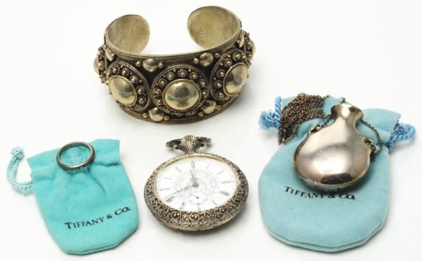 Lot of 4: Silver Pieces.: Includes one Tiffany 925 sterling necklace, one heavy sterling bracelet, one silver Swiss made open face pocket watch, and one Tiffany baby ring. Condition (Excellent). Size Ring Size: 4.Ring Size: 4.