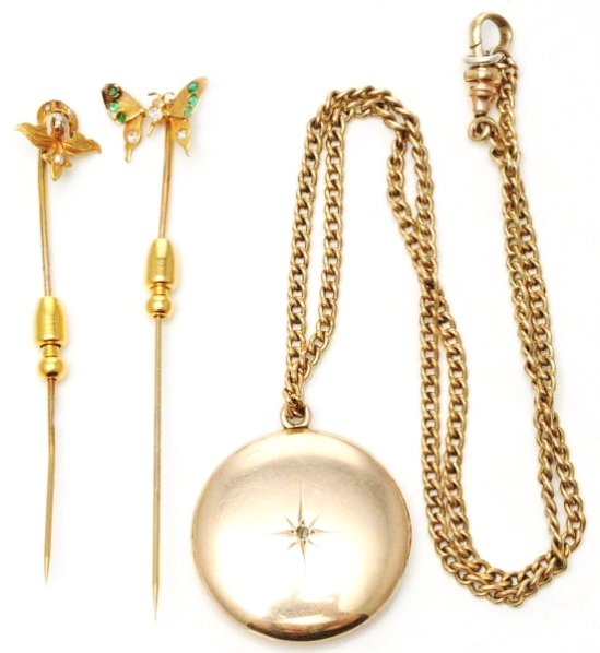 Lot of 3: Gold Jewelry Pieces.: Includes one 10K yellow gold locket and two 14K yellow gold pins with jewels. Condition (Excellent).(Excellent).