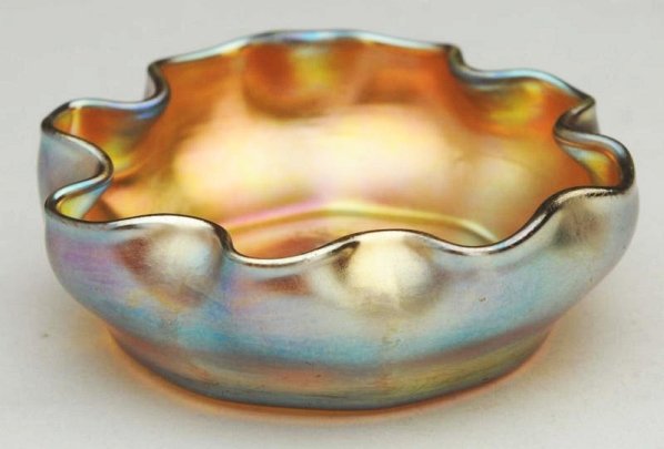 Small Tiffany Gold Favrile Salt Cellar.: A Tiffany gold favrile salt cellar with ruffled rim. Condition (Excellent). Size 2 - 3/4" Dia.2 - 3/4" Dia.(Excellent).