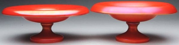 Lot of 2: Loetz Red Compotes.: A rare pair of fine red footed compotes by Loetz, circa 1920's. No damages. Condition (Excellent). Size Each: 11" Dia.Each: 11" Dia.(Excellent).