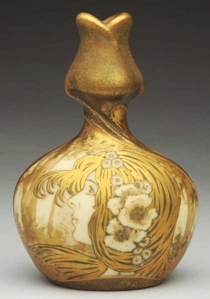 Small Amphora Side View Portrait Vase.: Of an art nouveau maiden with flowers in her hair. Base is marked with RSTK mark and amphora mark in blue ink. Condition (Mint). Size 6" T.6" T.(Mint).