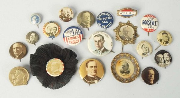 Lot of 20: Assorted 20th Century Pinback Buttons.: Includes pins depicting McKinley, Wilson, Taft, FDR, and others. A few have damage or wear. Condition (Very Good).
