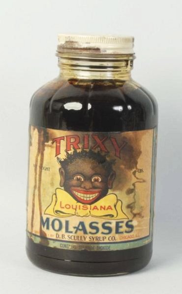 Trixy Molasses 5-lb Bottle.: C. 1920s-30s with original paper label. Label has some staining but central image areas still enjoyable. Condition (Good - Very Good). Size 8 - 1/2" T.