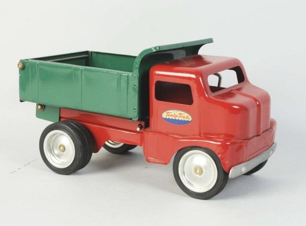 Pressed Steel Tonka Dump Truck.: Restored with new decals. Condition is just restored. Size 11" L.