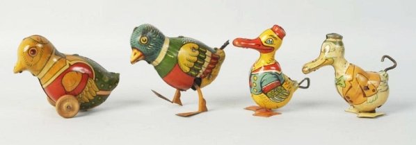 Lot of 4: Chein Tin Litho Wind-Up Animal Toys.: Including unusual bird. One bird push toy on rollers with early shield mark. Two wind-up ducks. One duck heavily scratched and faded. Rest of toys are nice. Condition (Very Good). Size Largest: 5" L.