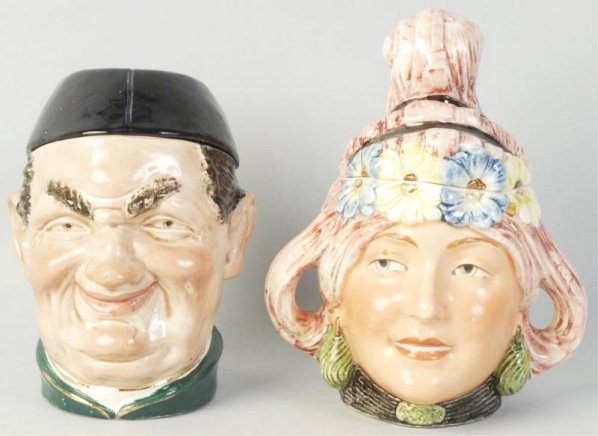 Lot of 2: Tobacco Humidors.: Includes one lady with a floral hat and one man with a hat. Man's hat has a repair. Condition (Very Good). Size Largest: 7 - 3/4" T.