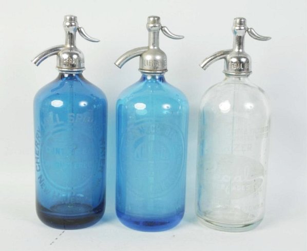 Lot of 3: Glass Seltzer Bottles.: Including Little Neck, Regal, and Cherry Hill Spring. No damages. Condition (Very Good - Excellent). Size Largest: 11" T.