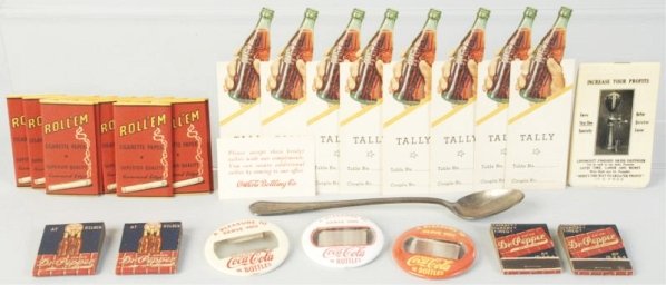 Lot of Coke & Other Advertising Smalls.: Nice assortment and includes a Coca-Cola silver teaspoon and an early Lippincott celluloid notebook, plus more! Condition (Near Mint). Size Largest: 7 - 3/4" L.