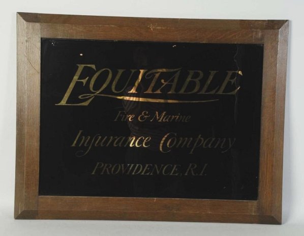 Lot of 2: Insurance Signs.: Includes a Glens Falls tin sign in what appears to be a period frame. Minimal amounts of wear. Second is a reverse on glass and Equitable fire and Marine Insurance Co. in a period Oak frame. Minimal a