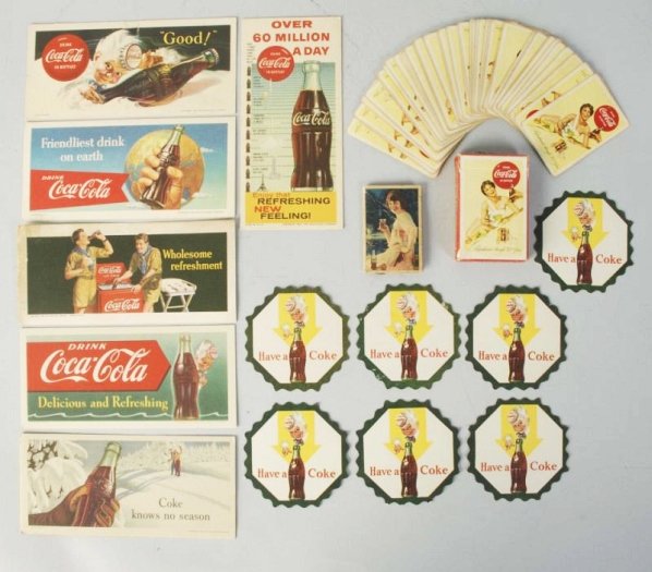Coca-Cola Blotters, Coasters, Card Deck.: Needle Case included. 14 pieces. Average wear. Condition (Very Good - Excellent). Size Largest: 7 - 1/2" L.